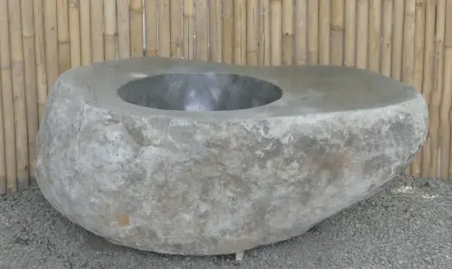 Product image of the product “Stone fire pit, made from Riverstone. Size about 120 x 80 x 40cm Height and the hole size is 51cm diameter and 28cm height ”